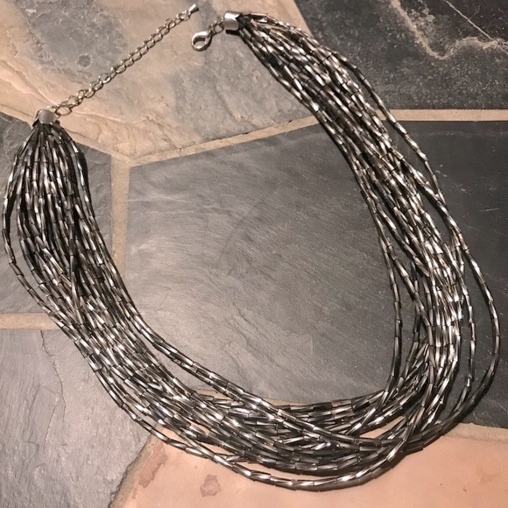 Multi-strand faceted bead necklace